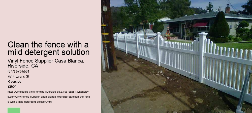 Clean the fence with a mild detergent solution
